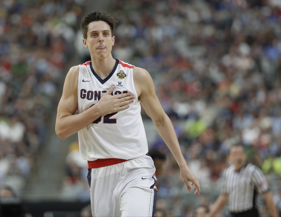 FILE - In This April 1, 2017 file photo, Gonzaga's Zach Collins reacts during the first half in the semifinals of the Final Four NCAA college basketball tournament against South Carolina in Glendale, Ariz. The role of the big man has changed in the NBA, and that‚Äôs evident in the way teams pick centers and post players entering the draft on Thursday, June 22, 2017. The Gonzaga freshman is considered a possible lottery pick entering Thursday's NBA draft.