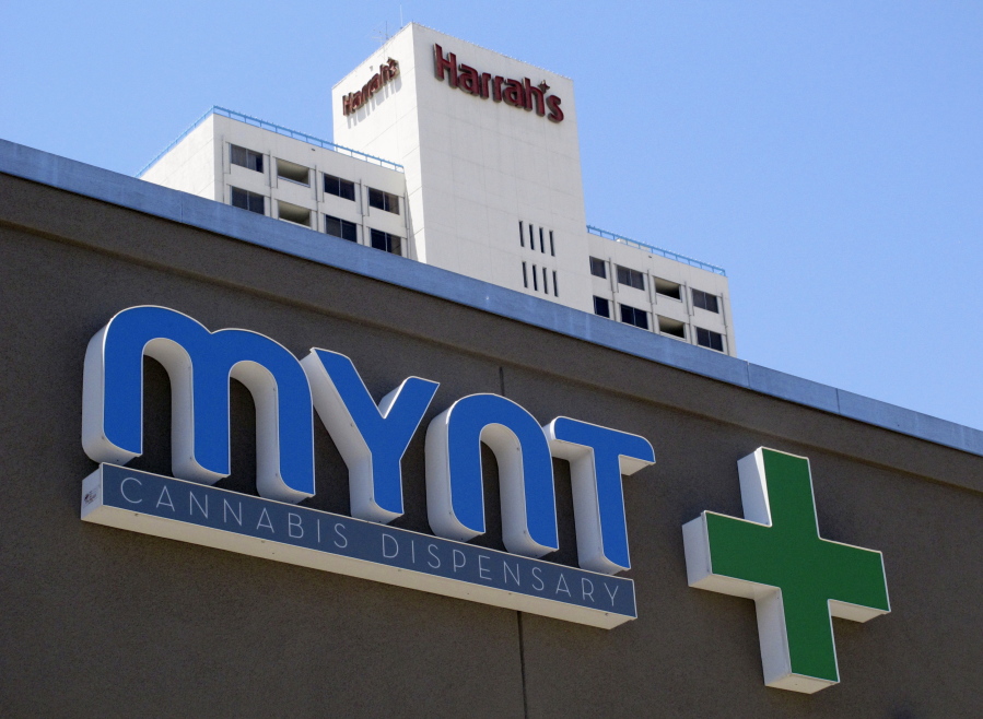 A sign on the Mynt Cannabis Dispensary across the street from Harrah’s hotel-casino in downtown Reno, Nev.