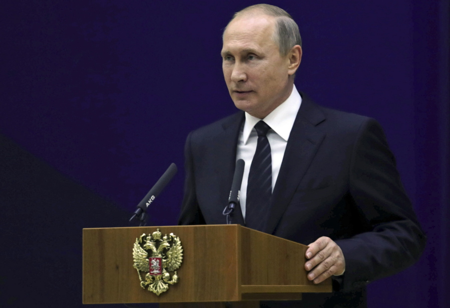 Russian President Vladimir Putin speaks before the officers of the Russian Foreign Intelligence at the headquarters of the Foreign Intelligence Service in Moscow, Russia, Wednesday, June 28, 2017. Putin attended a meeting marking the 95th anniversary of the Russian Foreign Intelligence’s so called ‘illegal’ section, which oversees agents working undercover abroad.