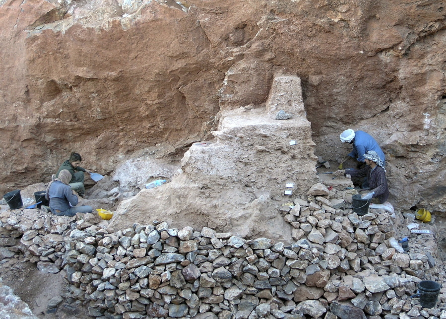 The March 2, 2007, photo provided by the Max Planck Institute for Evolutionary Anthropology shows excavators working on the remaining deposits the Jebel Irhoud site in Morocco where the oldest known fossils of human species have been unearthed, revealing an early evolutionary step toward developing the fully modern human body.
