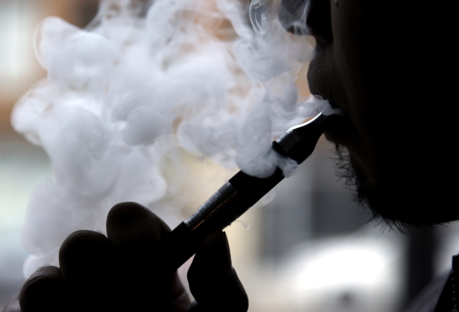 A large government survey released Thursday suggests the number of U.S. high school and middle school students using electronic cigarettes fell in 2016.