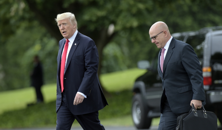 President Donald Trump walks with National Security Adviser H.R. McMaster from the Oval Office to Marine One on the South Lawn of the White House in Washington, Friday for a short trip to Andrews Air Force Base, Md., then onto Miami.