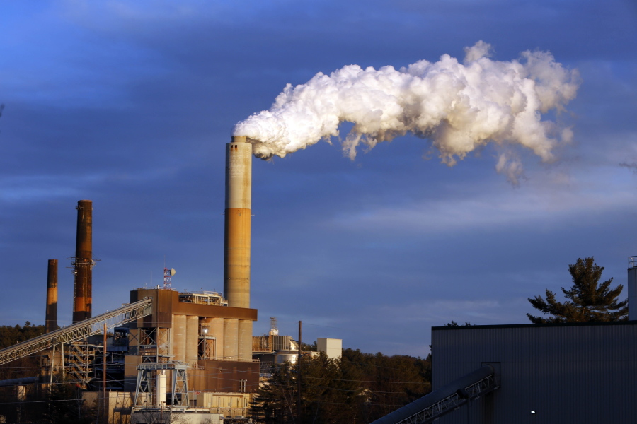 FILE - In this Jan. 20, 2015 file photo, a plume of steam billows from the coal-fired Merrimack Station in Bow, N.H. President Donald Trump said the United States Çƒúwill continue to be the cleanest and most environmentally friendly country on EarthÇƒù as he announced pulling out of an international accord designed to curb climate change. But facts muddy that claim. Data show the U.S. is among the dirtiest countries when it comes to heat-trapping carbon pollution. One nation that has cleaner air in nearly every way is Sweden.