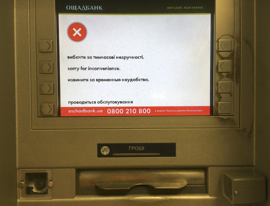 A screen of an idle virus affected cash machine in a state-run OshchadBank says “Sorry for inconvenience/Under repair” in Kiev, Ukraine, Wednesday, June 28, 2017. The cyberattack ransomware that has paralyzed computers across the world hit Ukraine hardest Tuesday, with victims including top-level government offices, energy companies, banks, cash machines, gas stations, and supermarkets.
