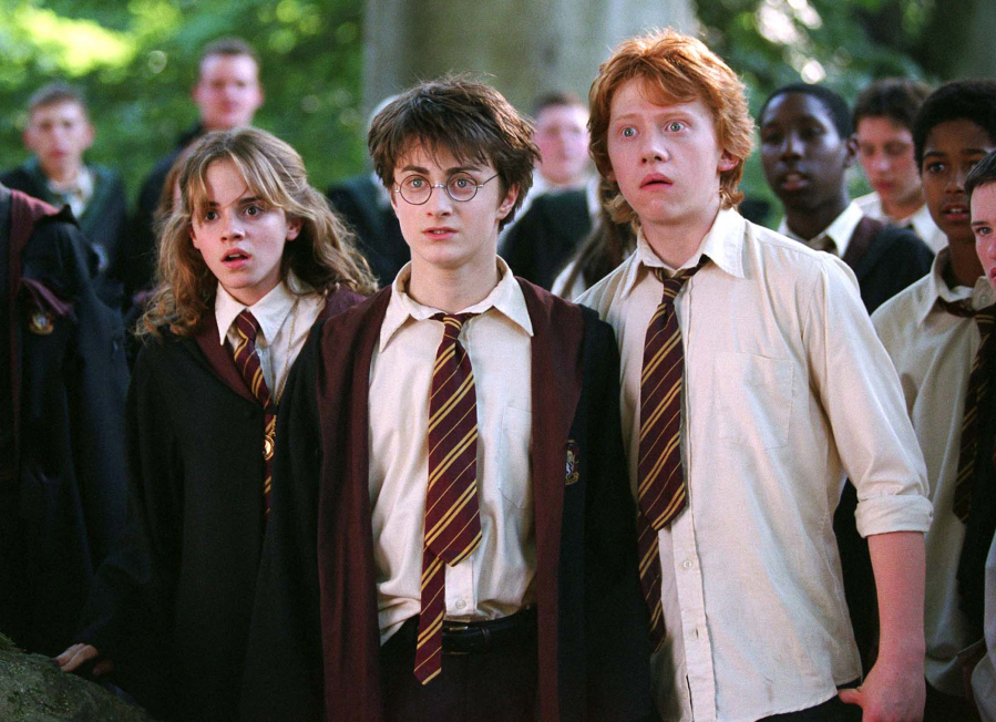 Emma Watson as Hermione Granger, from left, Daniel Radcliffe as Harry Potter and Rupert Grint as Ron Weasley are shown in a scene from “Harry Potter and the Prisoner of Azkaban.” Warner Bros.