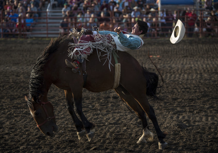 Cavy Pool of Long Creek, Oregon, competes in the bareback riding event during the 47th annual Vancouver Rodeo at Clark County Saddle Club in Vancouver on Friday evening, June 30, 2017. The Vancouver Rodeo will wrap up the holiday weekend with a final day of action and entertainment on Monday, July 3.