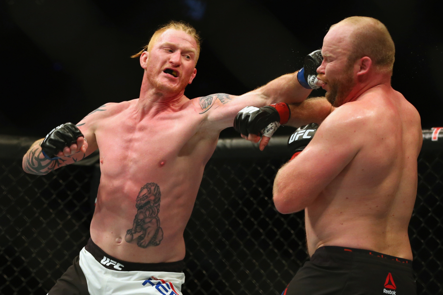 At nearly 37 years old, Ed Herman, left, knows the end of his competitive days in mixed martial arts is approaching. The Battle Ground fighter will rely on toughness and grit in Friday’s UFC bout against CB Dollaway in Las Vegas.
