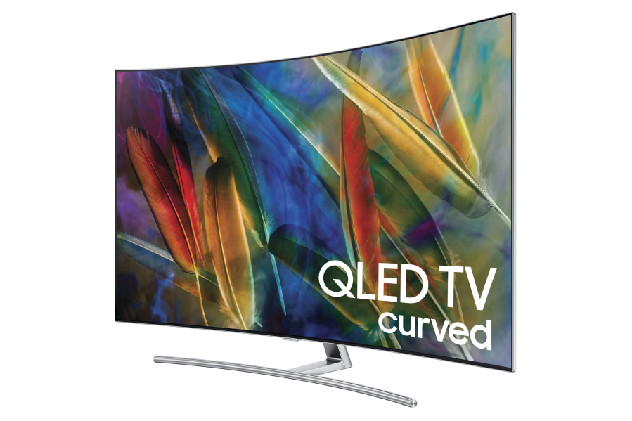 The Samsung QLED’s gently curved jet black screen reaches to within a quarter-inch of the edge of the panel.