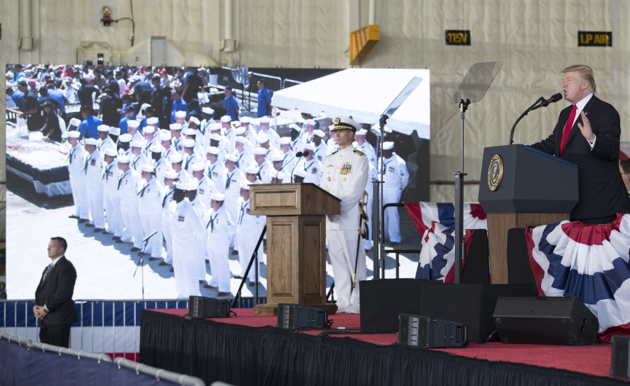 President Donald Trump speaks during the commissioning ceremony for the aircraft carrier USS Gerald R. Ford on Saturday at Naval Station Norfolk in Virginia.