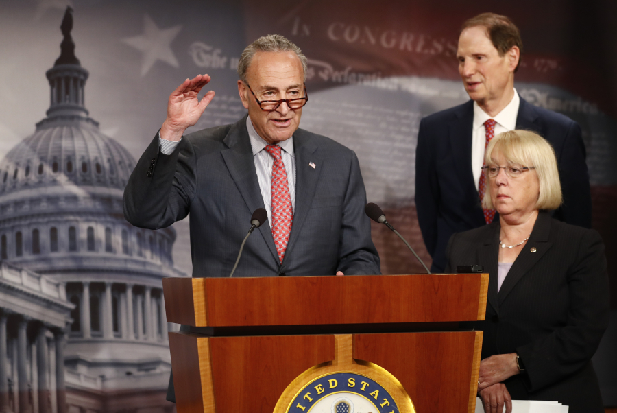Senate Minority Leader Chuck Schumer, D-N.Y., left, joined by Sen. Patty Murray, D-Wash., and Sen. Ron Wyden, D-Ore., speaks during a new conference on Capitol Hill in Washington, Monday, June 26, 2017, about the Senate Republicans health care bill.
