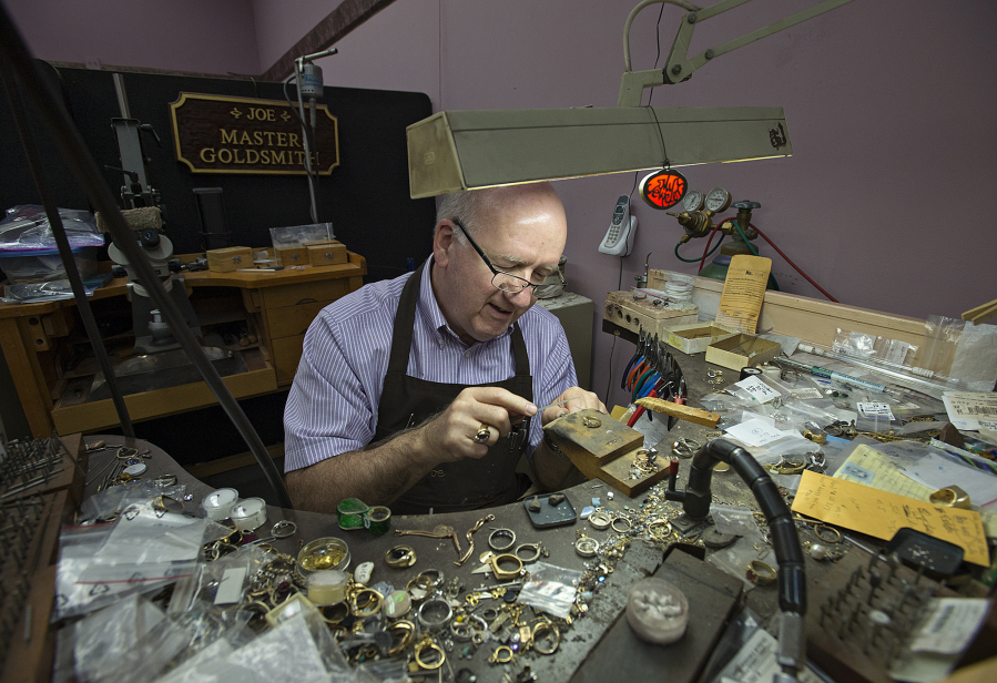 Joe Lanning, co-owner of My Jeweler, works on a ring in his downtown Vancouver shop. The 70-year-old hopes to work for years to come and is part of a growing share of older people in the workforce.