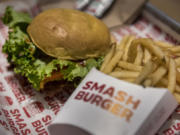 The Classic Smash burger and Smashfries with rosemary and herb seasoning are offered at Smashburger in the Ilani Casino Resort in Ridgefield.