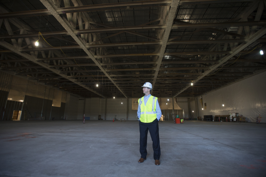 Tom Teesdale, vice president of marketing, pauses for a photo at the planned Ilani Casino Resort event center. When completed, the venue will be capable of hosting 2,500-seat concerts and conventions.