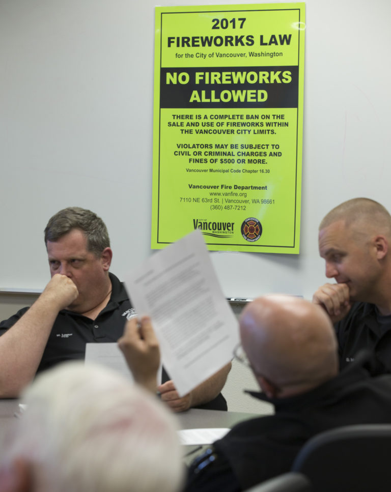 A sign indicating the rules of a fireworks ban hangs in a Vancouver Fire Department headquarters briefing room before a night of enforcement patrols on July 2.