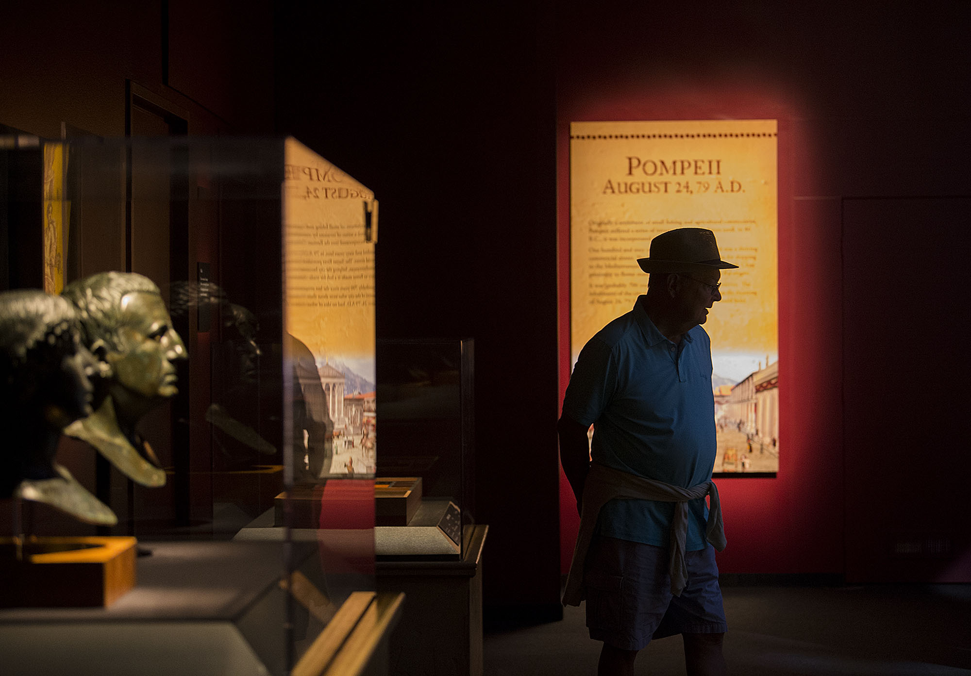 Lee Seaton of Jacksonville, Ore., joins fellow visitors as he strolls through displays at OMSI's Pompeii exhibit Friday morning, July 14, 2017.