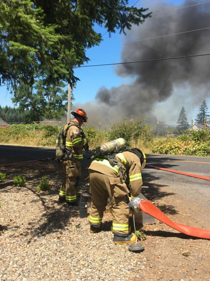 Firefighters get to work in the Hockinson area Wednesday.