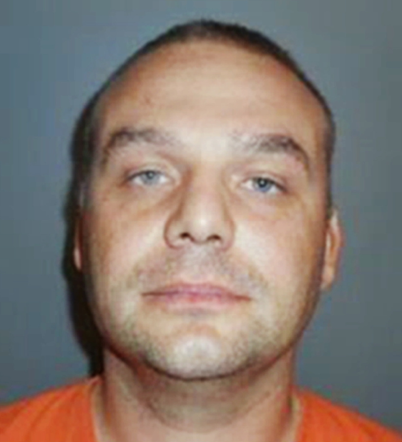 FILE - This undated file booking photo provided by the FBI shows Richard Gathercole of Roundup, Mont. Gathercole, dubbed the "AK-47 bandit," and suspected of bank robberies in five states, pleaded not guilty Monday, July 24, 2017, to unrelated charges in Nebraska. Gathercole entered the pleas in Dawson County District Court in Lexington, Neb., to two counts of possessing stolen firearms and one of theft or receiving stolen property, court records said.