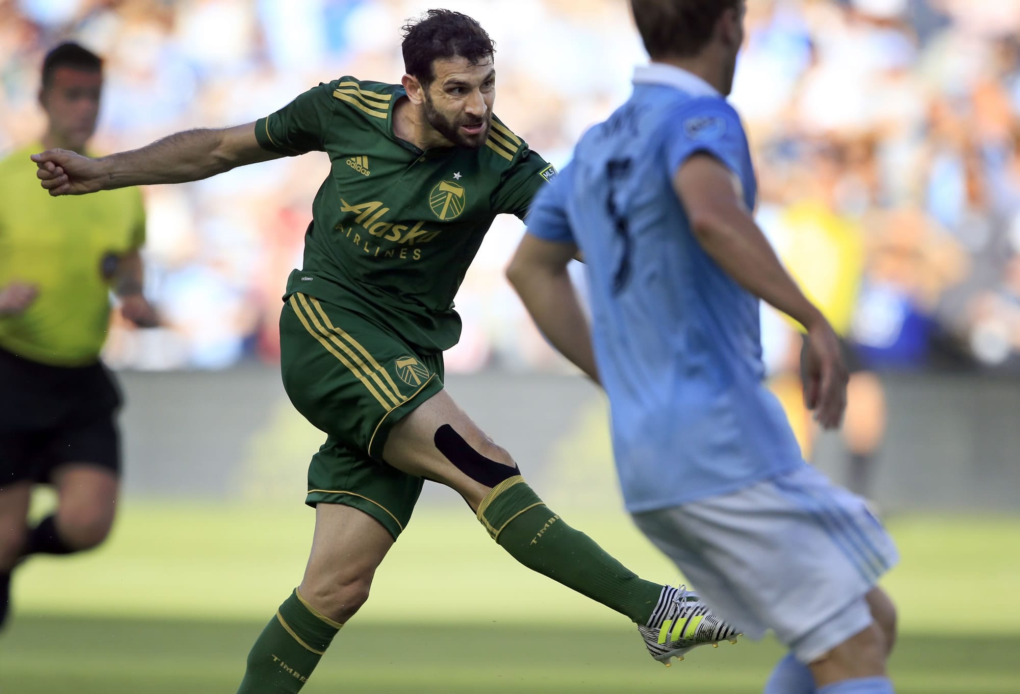 Portland Timbers midfielder Diego Valeri scores a goal during the first half of an MLS soccer match against Sporting Kansas City in Kansas City, Kan., Saturday, July 1, 2017.
