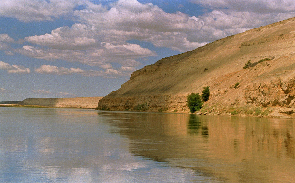 FILE - In this June 19, 2000, file photo, bluffs along the Columbia River are among the scenic attractions of the Hanford Reach National Monument, Wash. Interior Secretary Ryan Zinke said Thursday, July 13, 2017 that Hanford Reach is no longer under review for possible modification of their protected status.