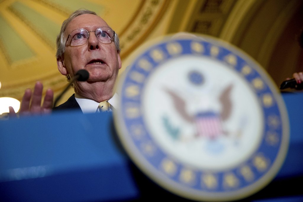 In this July 18, 2017 photo, Senate Majority Leader Mitch McConnell of Ky. speaks at a news conference on Capitol Hill in Washington.  There are many reasons why the Senate will probably reject Republicans’ crowning bill razing much of “Obamacare.” There are fewer why Senate Majority Leader Mitch McConnell might revive it and avert a GOP humiliation.