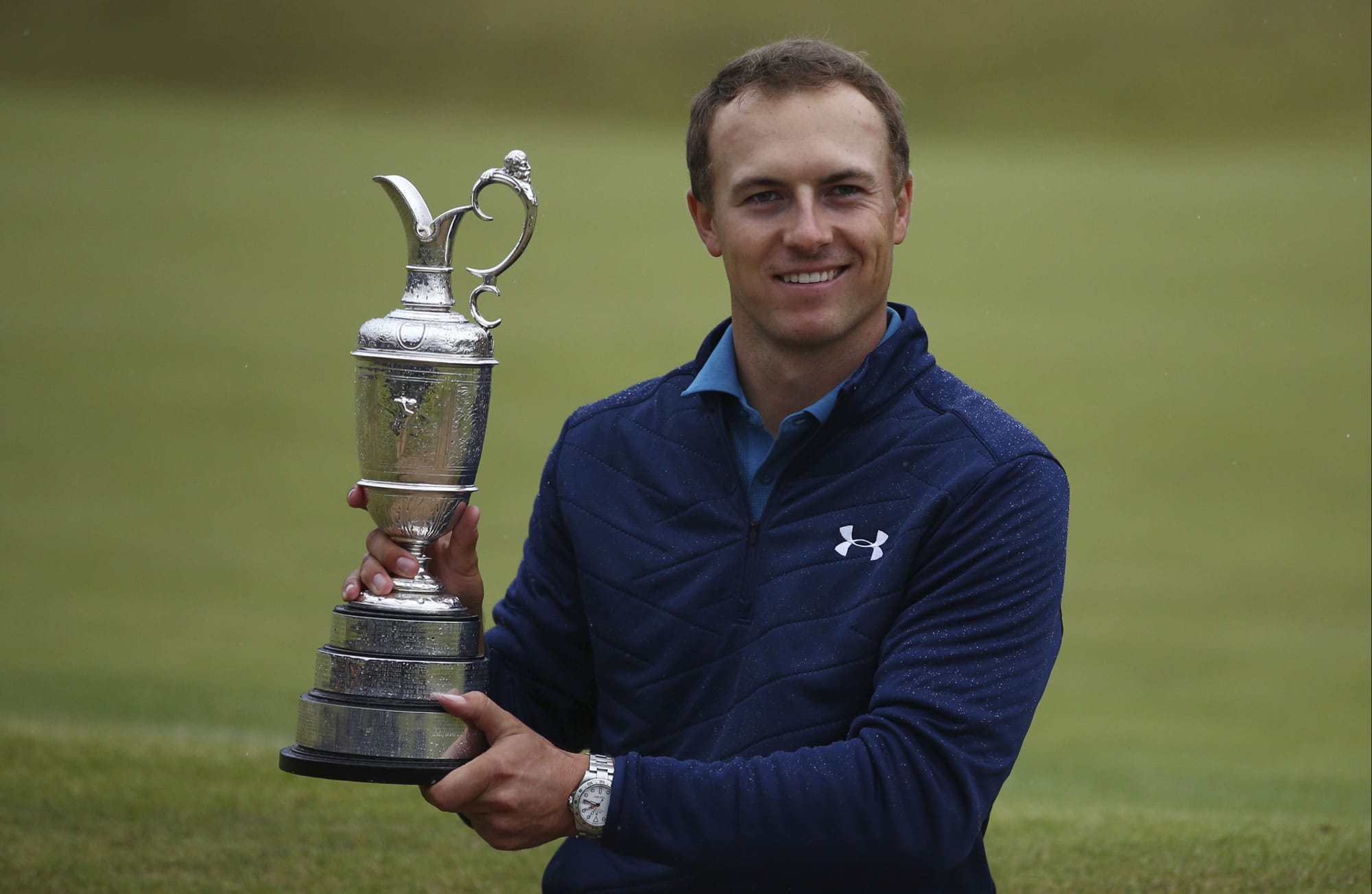 Jordan Spieth of the United States holds the Claret Jug after winning the British Open Golf Championships at Royal Birkdale, Southport, England, Sunday July 23, 2017.