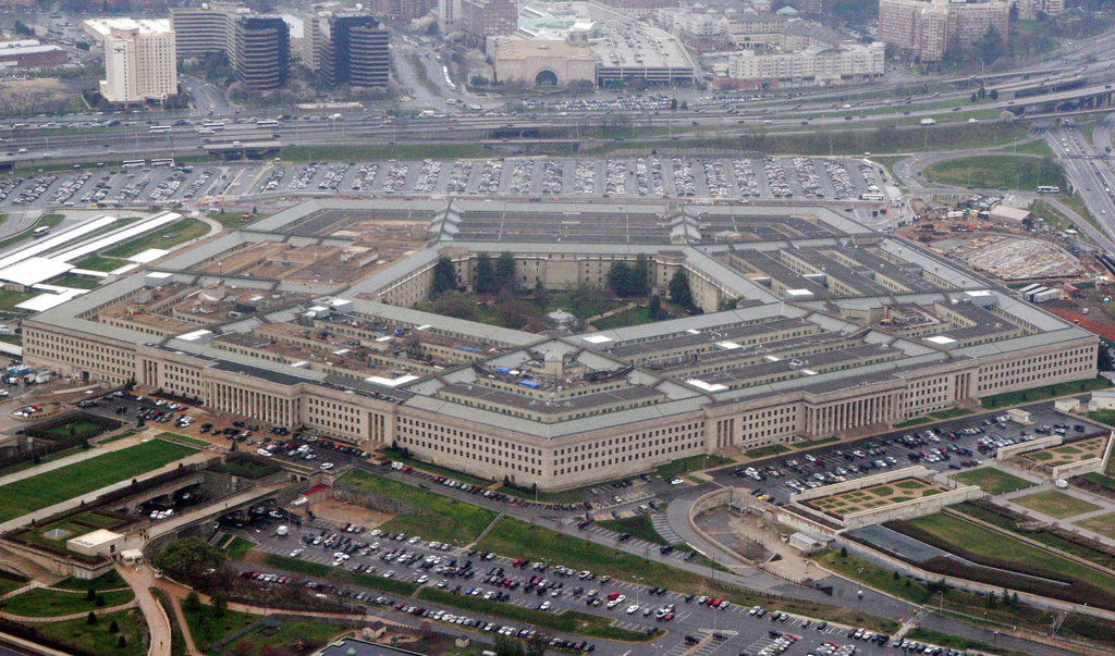 FILE - In this March 27, 2008 file photo, the Pentagon is seen in this aerial view in Washington. President Donald Trump says he will bar transgender individuals from serving “in any capacity” in the armed forces. Trump said on Twitter Wednesday, July 26, 2017, that after consulting with “Generals and military experts,” that “the U.S. Government will not accept or allow Transgender individuals to serve in any capacity in the U.S.