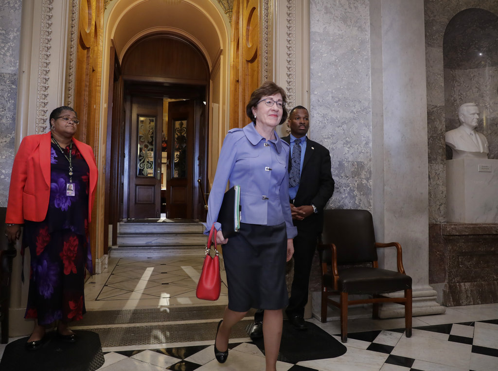 Sen. Susan Collins, R-Maine, leaves the chamber as the Republican-run Senate rejected a GOP proposal to scuttle President Barack Obama's health care law and give Congress two years to devise a replacement, Wednesday, July 26, 2017, at the Capitol in Washington. President Donald Trump and Senate Majority Leader Mitch McConnell, R-Ky., have been stymied by opposition from within the Republican ranks. (AP Photo/J.