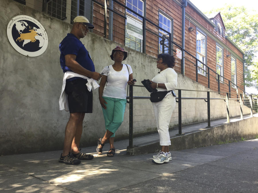 Ron Young, Gahlena Easterly and Sharon Steen reminisce as they take a mile-long walk through North Portland streets that once were full of black-owned homes and businesses. Researchers are studying whether jogging memories where they were made can help African-American seniors stay sharp and slow early memory loss.