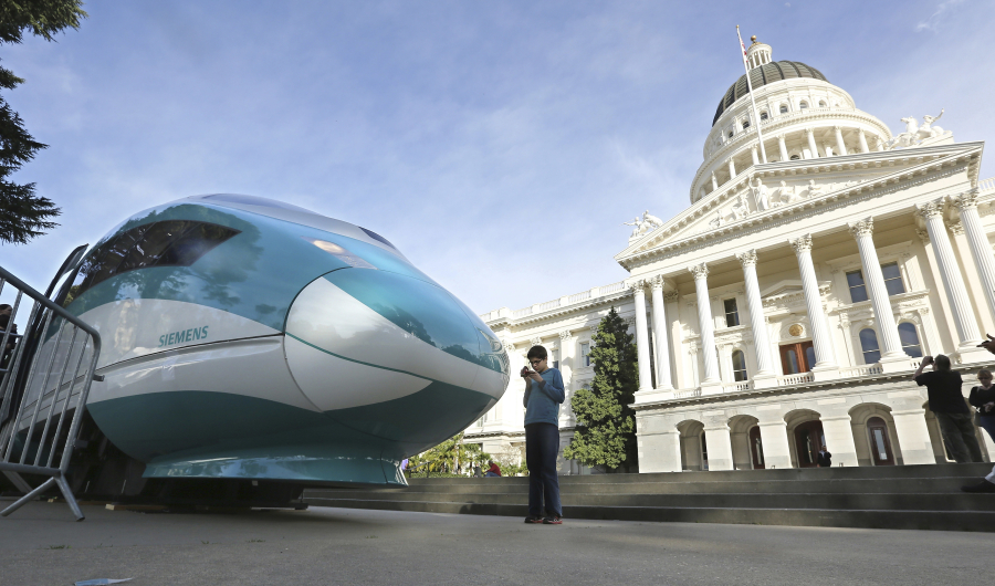 A full-scale mock-up of a high-speed train is displayed at the Capitol in Sacramento, Calif. The California Supreme Court is set to issue a ruling that could have big implications for the state’s $64 billion high-speed rail project. The court will decide Thursday, July 27, 2017, whether federal law exempts rail projects such as the planned bullet train between Los Angeles and San Francisco from the state’s strict environmental review law known as CEQA.