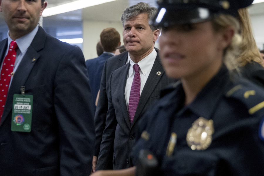 FBI Director nominee Christopher Wray walks on Capitol Hill in Washington, Tuesday.