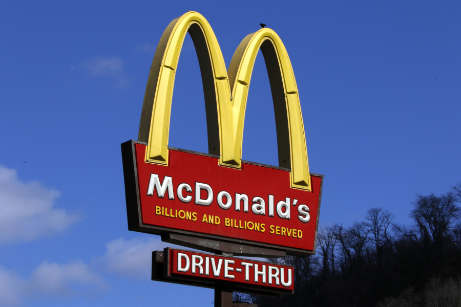This Friday, March 17, 2017, photo shows the McDonald’s sign outside a restaurant in downtown Pittsburgh. McDonald’s Corp. reports earnings, Tuesday, July 25, 2017. (AP Photo/Gene J.