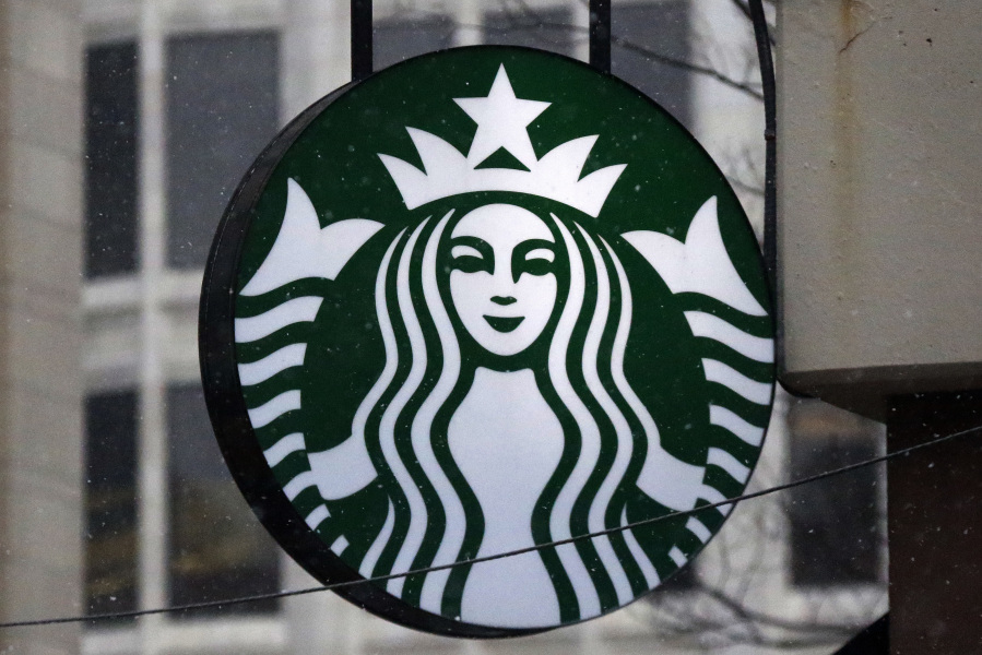FILE - This Tuesday, March 14, 2017, file photo show the Starbucks logo on a shop in downtown Pittsburgh. Starbucks Corp. reports earnings, Thursday, July 27, 2017. (AP Photo/Gene J.
