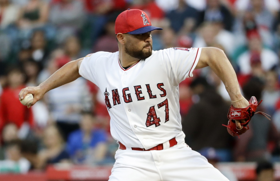 Los Angeles Angels starting pitcher Ricky Nolasco throws to the Seattle Mariners during the first inning of a baseball game in Anaheim, Calif., Saturday, July 1, 2017.