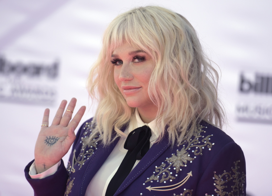 Kesha arrives at the Billboard Music Awards at the T-Mobile Arena in Las Vegas. Kesha released “Praying” on July 6. The song is the lead single from the singer’s first album in five years.