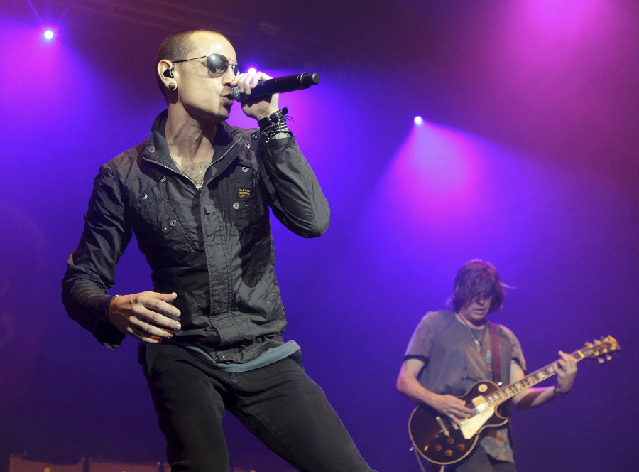 Chester Bennington, left, performs May 16, 2015 during the MMRBQ Music Festival 2015 at the Susquehanna Bank Center in Camden, N.J. The Los Angeles County coroner says Bennington, who sold millions of albums with a unique mix of rock, hip-hop and rap, has died in his home near Los Angeles. He was 41. Coroner spokesman Brian Elias says they are investigating Bennington’s death as an apparent suicide but no additional details are available.
