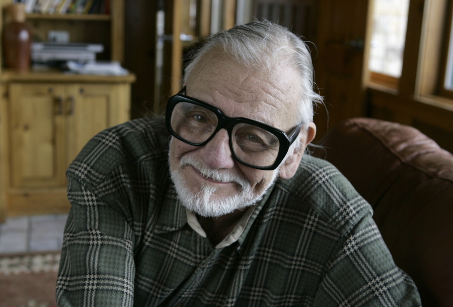Director and writer George Romero poses for a photograph in 2008 while talking about his film "Diary of the Dead' at the Sundance Film Festival in Park City, Utah. George Romero, whose classic "Night of the Living Dead" and other horror films turned zombie movies into social commentaries and who saw his flesh-devouring undead spawn countless imitators, remakes and homages, has died. He was 77.