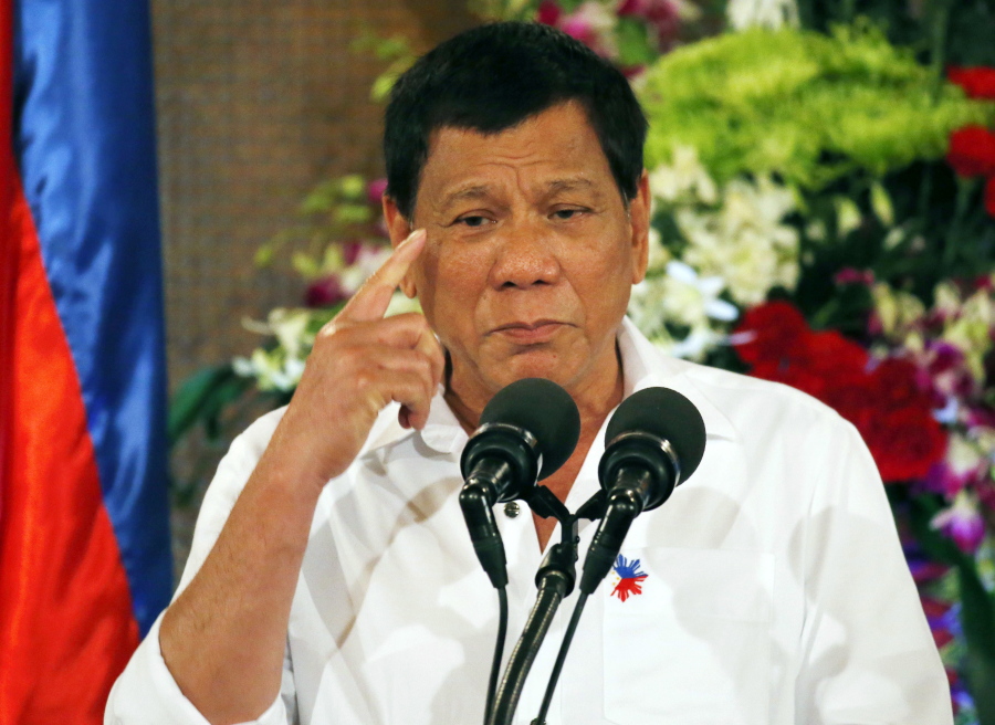 Philippine President Rodrigo Duterte gestures while addressing Filipino Muslims in Manila, Philippines.