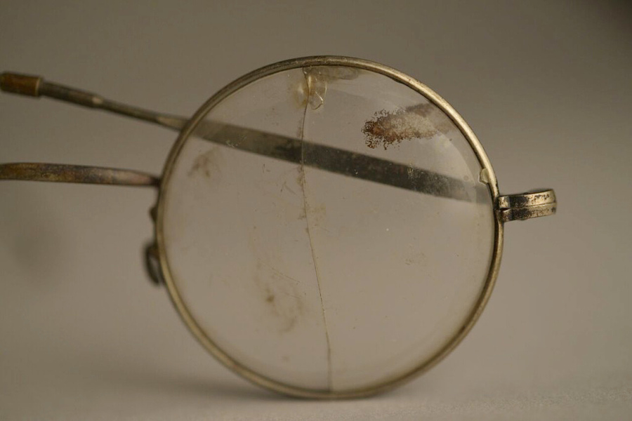 Glasses that once belonged to a person who perished at Auschwitz are seen.