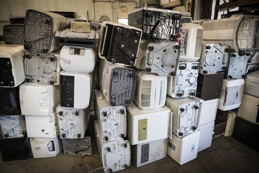A pile of dead dehumidifiers was stacked up and readied for recycling at J.R.’s Advanced Recyclers in Inver Grove Heights, Minn.