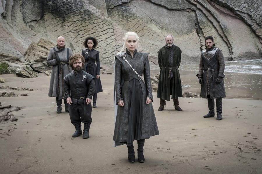 Conleth Hill, from left, Peter Dinklage, Nathalie Emmanuel, Emilia Clarke, Liam Cunningham and Kit Harington appear in a scene from “Game of Thrones” season 4, episode 7. Macall B.