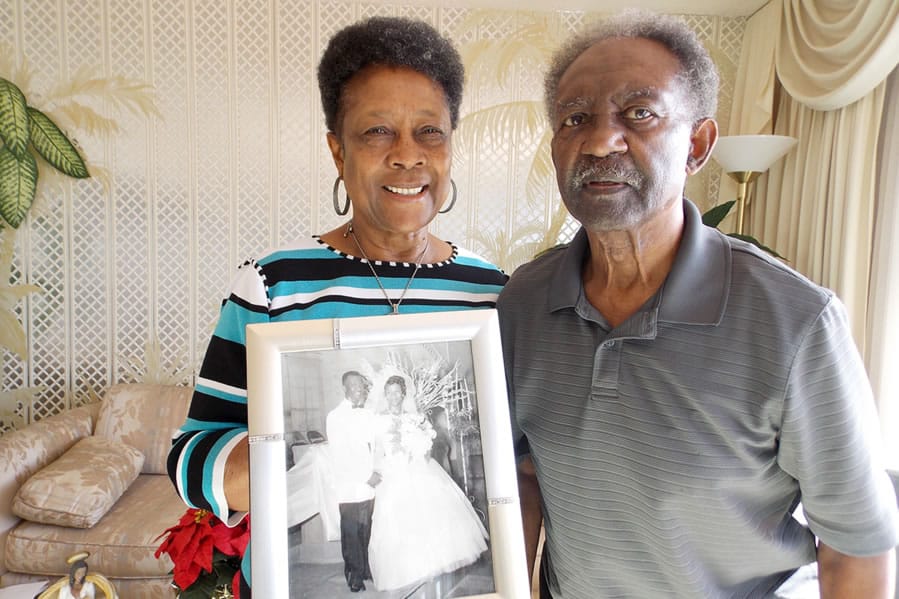 Dorothy and Levi Reeves of Oakland, Calif., hold their wedding photo from 57 years ago. Dorothy Reeves agreed to donate both of their brains after death to the University of California, Davis for research.