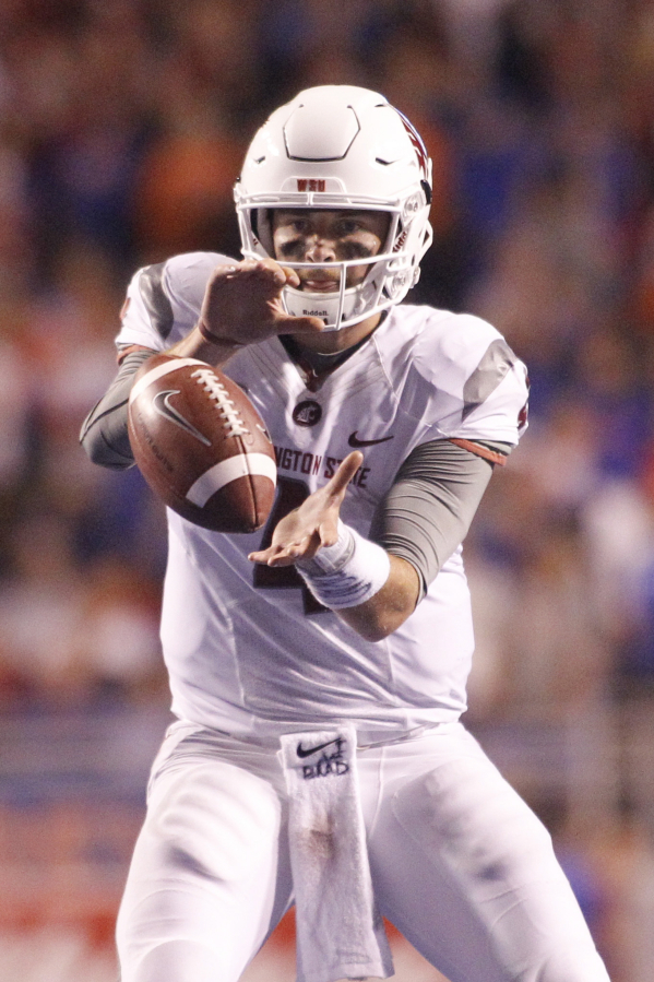 Otto Kitsinger/Associated Press Washington State quarterback Luke Falk (4) takes the snap during the second half of an NCAA college football game against Boise State in Boise, Idaho, on Saturday, Sept. 10, 2016.