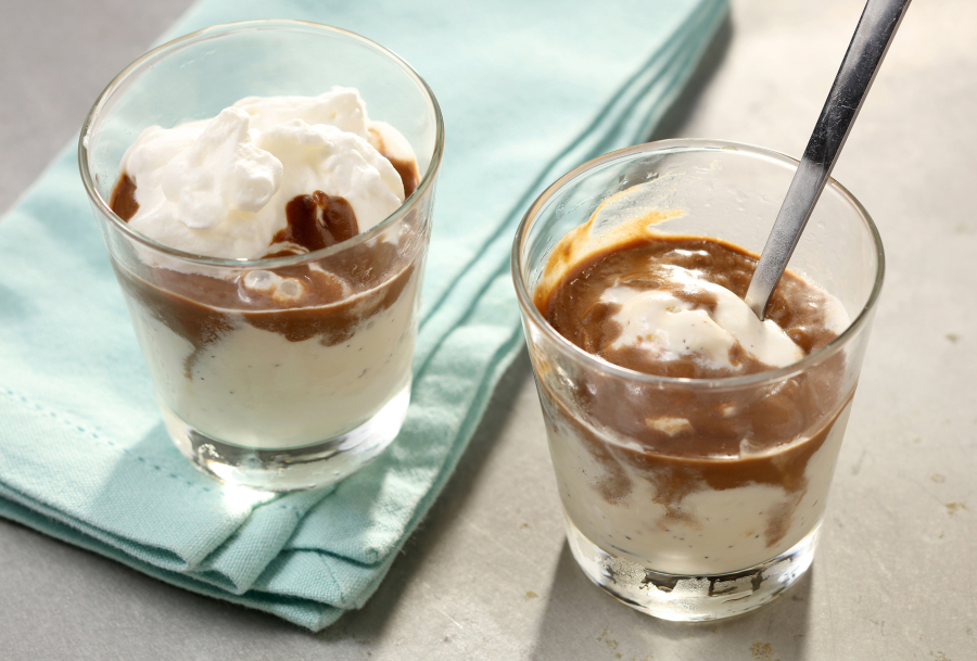 Coffee and milk chocolate combine for a custard to pour over plain vanilla ice cream.