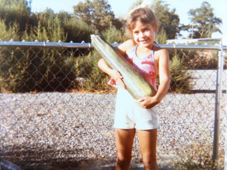 Lucy Luginbill’s daughter, Tiffany, strikes a pose in the summer of 1978 with the zucchini that arrived at the right time.