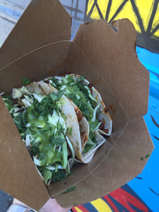 Taco City Food Truck offers up a variety of tacos at Trap Door Brewing’s outdoor area.