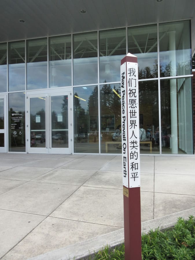 Fircrest: A Peace Pole at the Cascade Park Community Library, which was donated by Rotary Club of Vancouver and Rotary District 5100 to promote peace throughout the world.