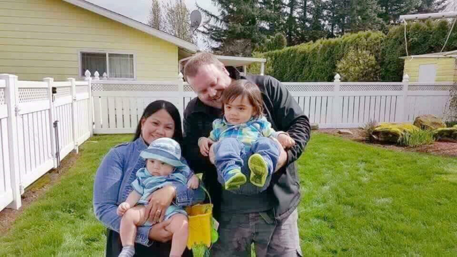 The McAllister family — Melissa, holding Christopher, and Guy, holding AJ — of Vancouver is recovering after a crash in the Walnut Grove Safeway parking lot.