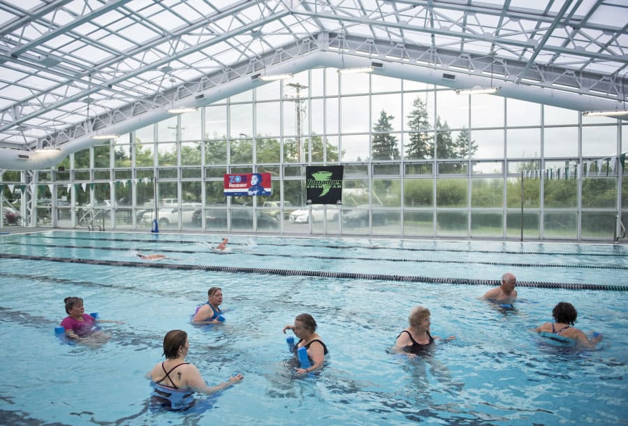Swimmers participate in a deep-water fitness class at the Clark County Family YMCA in Vancouver. It’s the only full YMCA in the county, but groups in Ridgefield, Woodland and Battle Ground have all started the process to bring in YMCAs, and a group in east county has had preliminary discussions on looking into it.
