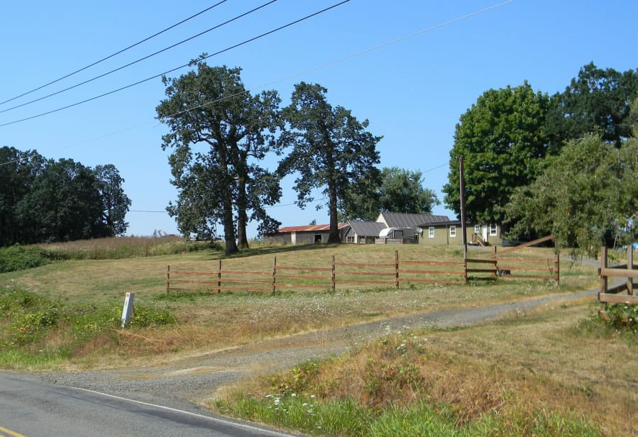 This property along a road outside of Washougal still has buildings from its past agricultural use. But a conservation group worries McMansions will be added.