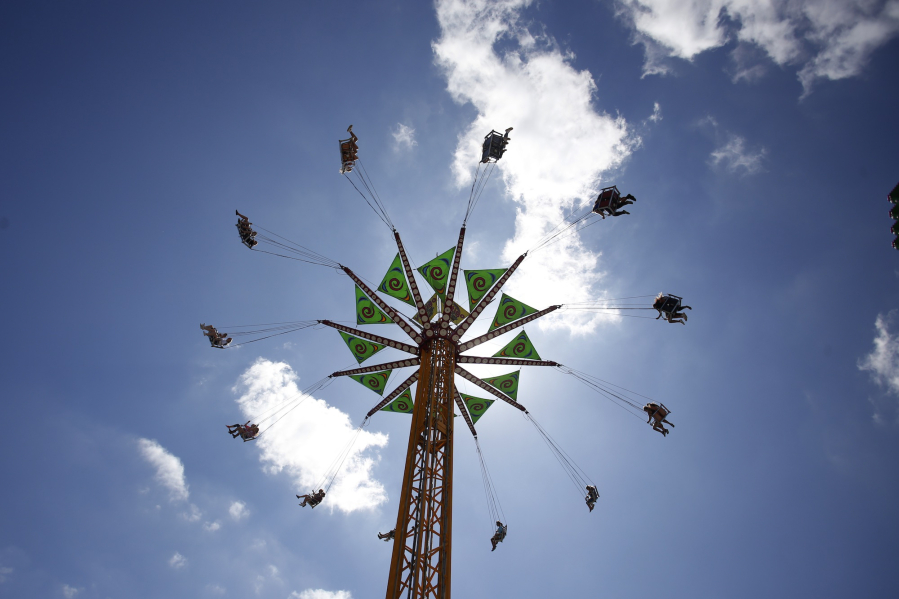 Patrons enjoy the “Vertigo” ride at the Clark County Fair.